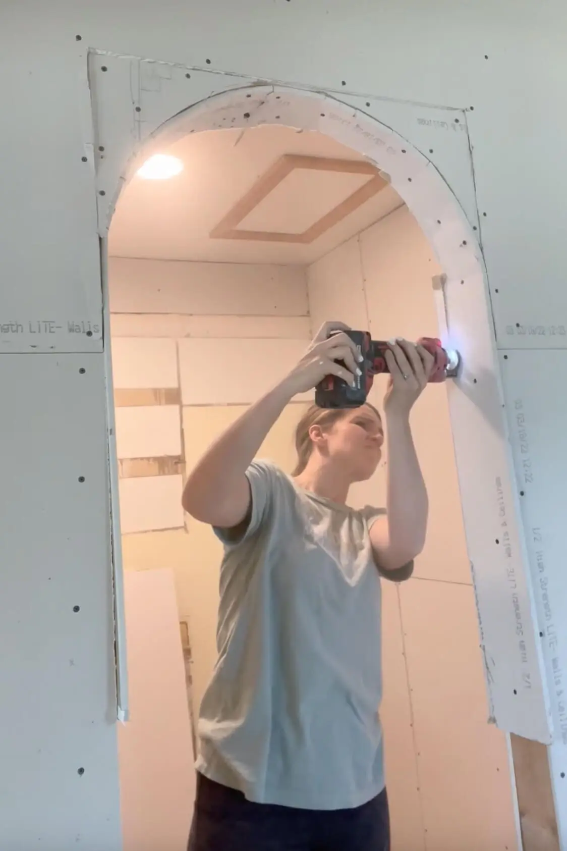 Adding drywall to an arched doorway. 